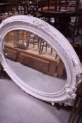 An oversized foliate wall mirror, approx. 153 x 107cm