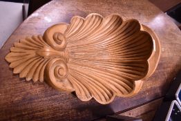 A carved wooden wall sconce, width approx. 33cm