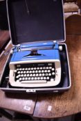A vintage typewriter, Imperial Safari model, with case
