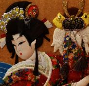 20th Century Japanese School, textile collage, A half length portrait of a Geisha lady, framed,