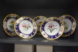A set of four Coalport style display plates and a matching footed bowl AF in four different floral