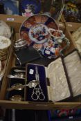 A boxed set of six silver Art Deco grapefruit spoons, a boxed set of silver plated grape scissors, a