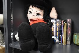 A novelty Big Softy Michael Jackson soft toy, and a small number of VCR video tapes and DVDs