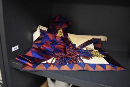 A Masonic kid leather apron with matching sash.