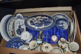 A boxed set of five crystal spirit glasses, an assortment of blue and white plates and dishes, a