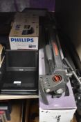 A Cobra Eclipse photography tripod and a similar Velbon tripod, a Philips portable DVD player and
