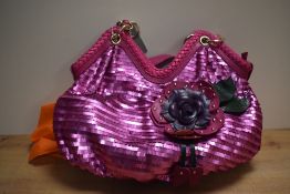An original by Sharif 1827 pink sequin shoulder bag with floral motif, sold with dust cover.