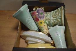 Six assorted wall pockets including a Burleigh Ware tiger's claw design having raised squirrel, deer