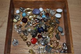 A selection of clip on earrings, including enamelled examples, paste set examples, hoops and some