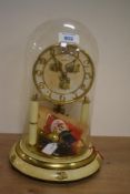 A 20th Century Bentima Anniversary clock, the dial having applied gilt metal Arabic numerals above a