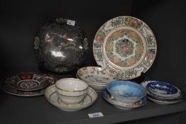 A 20th Century Chinese Famille Rose medallion plate, decorated in polychrome with floral sprays