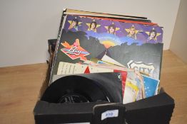A selection of vintage LP records, including 'The Andy Williams Christmas Album', and various 45 RPM