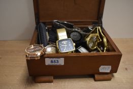 A wooden jewellery box, containing a selection of wristwatches, including Vialli, Geneva and Oskar