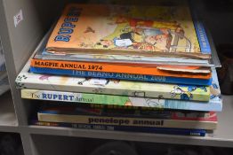A selection of vintage children's annuals to include Beano, Rupert etc.
