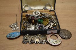 An assortment of costume brooches and badges, including paste set examples, Celtic inspired pieces
