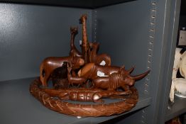 A selection of African carved hardwood animal studies, to include an articulated snake measuring