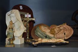 A 20th Century Parian Ware style bust of a hooded Madonna, measuring 20cm high, an Italian resin