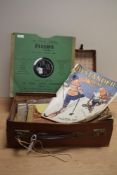 A small vintage suitcase with three copies of 'The Studio' and two issues of the 'Bystander