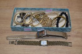 A small assortment of costume jewellery and wristwatches, including a lava bead bracelet,
