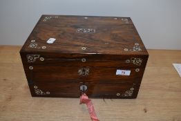 A Victorian rosewood jewellery box and writing slope, having Mother of Pearl inlaid detail and metal