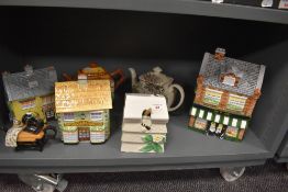 A 20th Century tiered ceramic honey pot with wooden dipper, in the form of a beehive and measuring