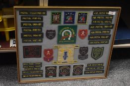 A framed and glazed Shooting Patches display, 1977-1988 including Leicestershire & Rutland Rifle