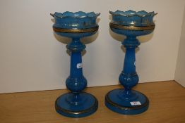 A pair of Victorian gilt enriched blue glass table lustres, unfortunately lacking it's cut-glass