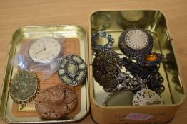 A small collection of brooches, including marcasite set pieces and paste set pieces, along with a