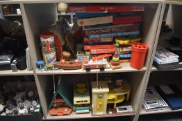 A large selection of children's vintage games and toys comprising Etch a Sketch, Monopoly, Fisher