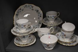 Twenty one pieces of Colclough bone china tea wares, comprising six cups, six saucers, six side