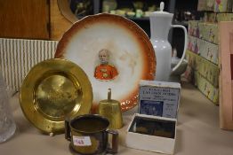 Three items of Trench Art, metal plate decorated with Leeds Pals, Shell made into a Two Handeled Cup