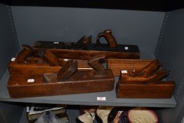 A selection of woodworking planes, block planes, moulding plane and including a wooden cased