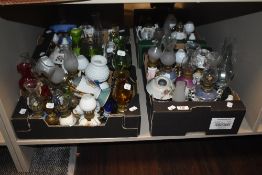 Four boxes of vintage miniature oil lamps in varied designs and colourways.
