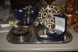 A Royal Crown Derby English bone china saucer stamped 1128 to the rear sold alongside silver