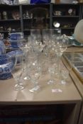 An assortment of attractive vintage glasses with twisted stems, comprising seventeen pieces