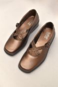 Four pairs of modern ladies comfortable shoes. A pair of Van Dal comfort loafers in burgundy-brown