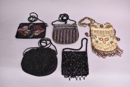 Five modern heavily beaded ladies bags, all in good condition. A cross body bag, embellished all