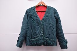 A French 1950s handmade one-off quilted jacket in forest green denim-look fabric, featuring 3D