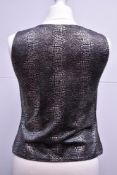 Seven pieces of 1980s to 2000s monochrome and metallic day-to-night 'office siren' clothing. An