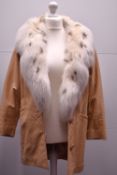 A J. Percy for Marvin Richards Made in U.S.A. 3/4 length coat in beige leather, featuring a dramatic