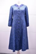 A Harriet Gubbins Mother-of-the-Bride coat dress in French blue and navy floral jaquard, with a