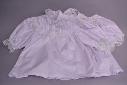 Four 1970s Cobannau white cotton blouses, from the Welsh factory known for the style, which closed