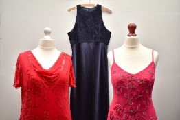 Three modern long evening or bridesmaids' dresses. A Ann Harvey floor length dress in raspberry
