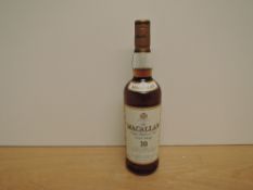 A bottle of The Macallan 10 Year Old Single Highland Malt Scotch Whisky, early 2000's bottling,