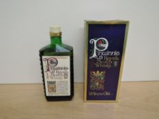 A bottle of Pinwinnie Royale Blended Scotch Whisky, 12 year old, 43 GL, vol, 75cl, in draw cloth bag