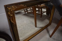 A modern gilt framed wall mirror, approx. 106 x 76cm