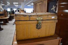 A vintage tin travel trunk of small proportions , width approx. 53cm
