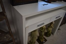 A white laminate side table