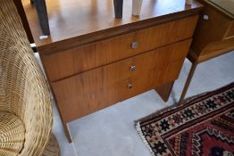 A vintage bedroom chest of small proportions having three drawers, width approx. 71cm