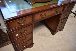 A reproduction Regency pedestal desk